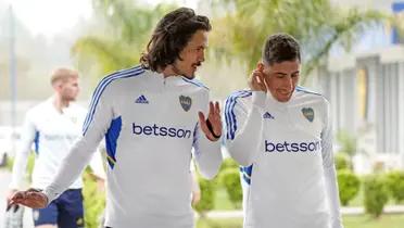 Cavani junto a Merentiel.